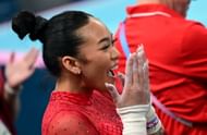Suni Lee from the USA celebrates the bronze medal in the uneven bars at the 2024 Olympics in Paris, France. (Photo via Getty Images)